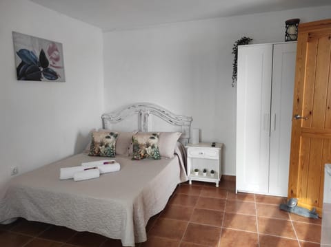 Bed, wardrobe