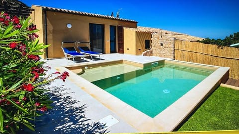 Property building, Patio, Day, Natural landscape, Garden, Garden view, Pool view, Swimming pool, sunbed
