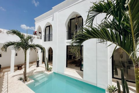 Property building, Patio, Day, Pool view, Swimming pool