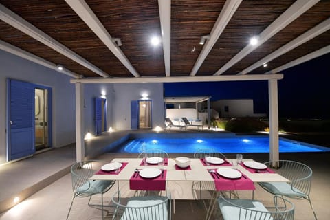 Patio, Night, Seating area, Pool view, Swimming pool