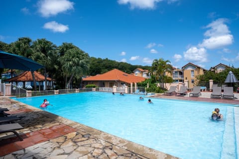 Property building, Natural landscape, Pool view, Swimming pool, sunbed