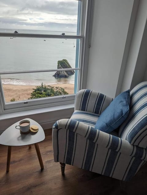 Natural landscape, View (from property/room), Living room, Seating area, Beach, Sea view