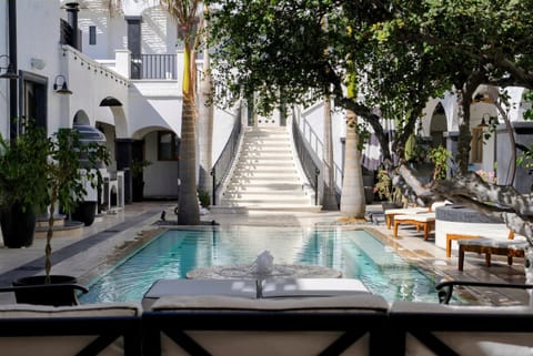 Property building, Patio, View (from property/room), Balcony/Terrace, Pool view, Swimming pool, sunbed