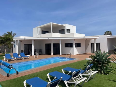 Property building, Living room, Swimming pool