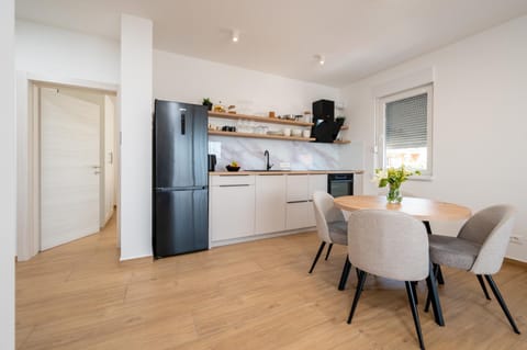 Kitchen or kitchenette, Dining area, dishwasher, oven