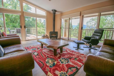 Patio, Natural landscape, View (from property/room), Living room, Seating area, fireplace, heating