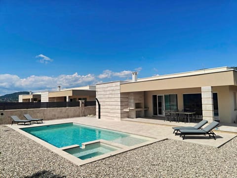 Property building, Patio, Day, Natural landscape, BBQ facilities, Pool view, Swimming pool, Swimming pool, Swimming pool, sunbed