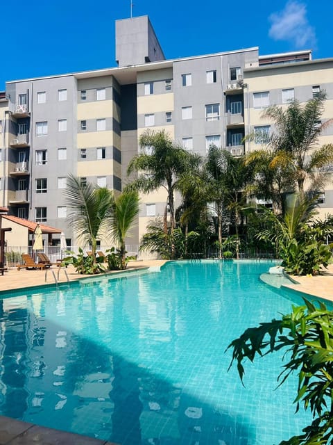 Property building, Day, Pool view, Swimming pool, sunbed
