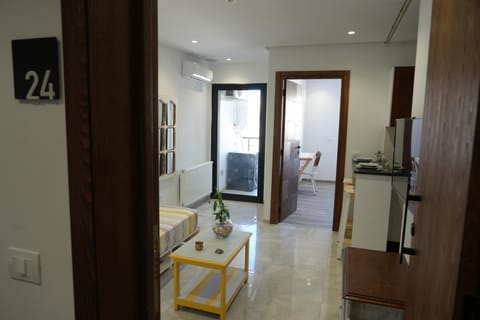 Kitchen or kitchenette, Living room, Seating area, Dining area