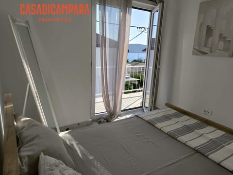 Bed, Natural landscape, Bedroom, Sea view