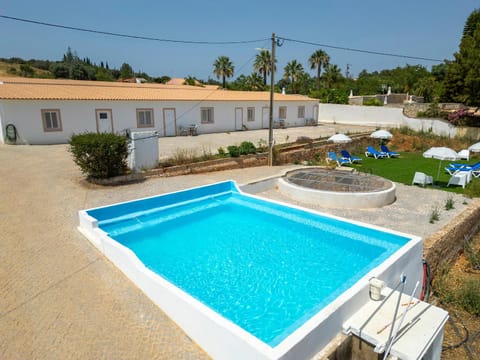 Property building, Swimming pool, sunbed