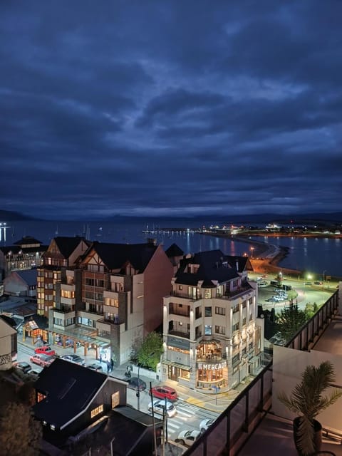 Property building, Night, Neighbourhood, Natural landscape, City view, Sea view, Street view, Location