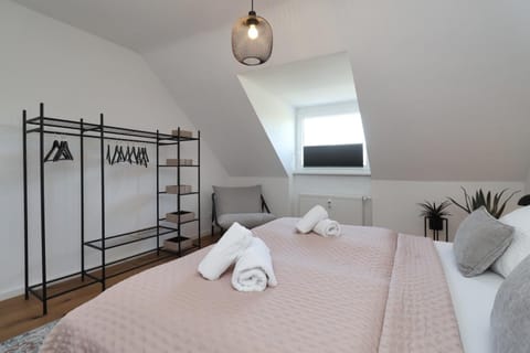 Bed, Bedroom, Landmark view, towels, wardrobe