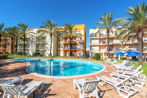 Property building, Patio, Spring, Day, Pool view, Swimming pool, sunbed