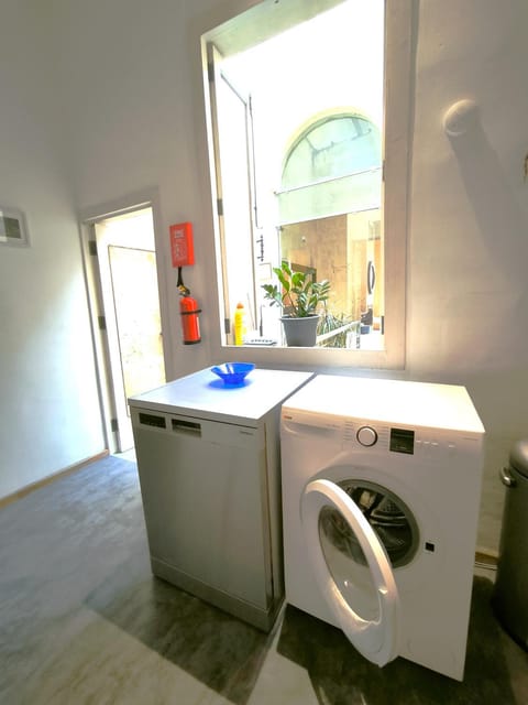 Kitchen or kitchenette, washing machine