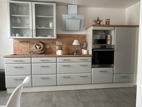 Kitchen or kitchenette, oven, stove