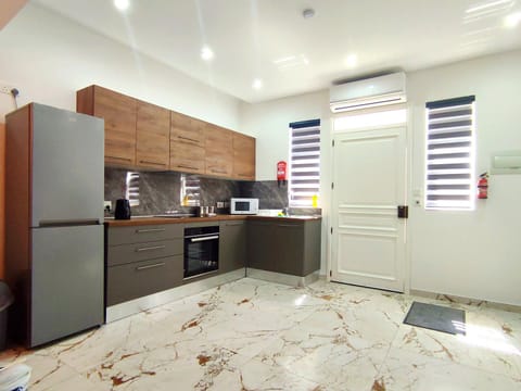 Kitchen or kitchenette, oven, stove