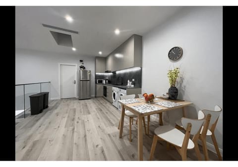 Kitchen or kitchenette, Kitchen or kitchenette, Dining area, microwave, washing machine