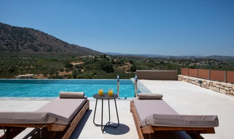 Patio, Natural landscape, Pool view, sunbed
