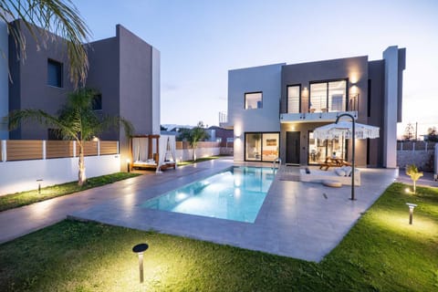 Property building, Patio, Night, Natural landscape, Garden, Garden view, Pool view, Swimming pool, sunbed