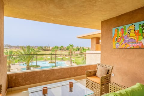 Patio, Day, View (from property/room), Balcony/Terrace, Living room, Seating area, Pool view, Swimming pool, sunbed
