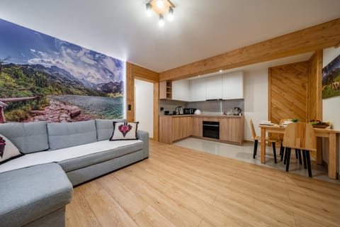 Kitchen or kitchenette, Living room, Seating area, Dining area