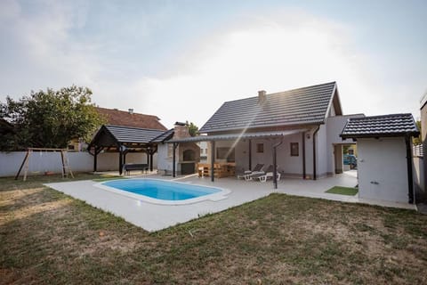 Property building, Patio, Day, Swimming pool
