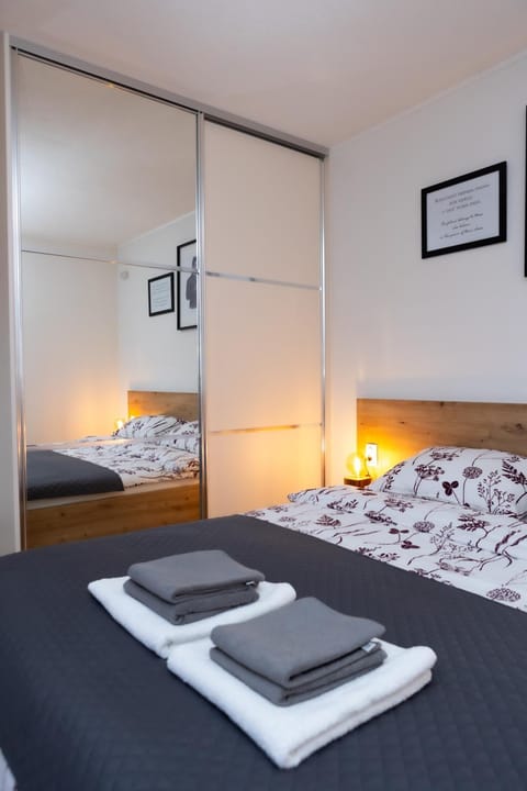 Bed, Photo of the whole room, Bedroom, towels, wardrobe