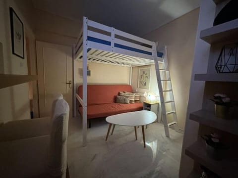 Bed, Living room, Seating area, Bedroom