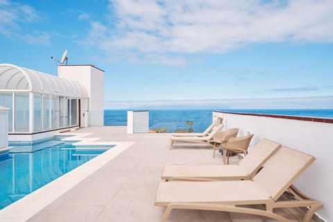 View (from property/room), Pool view, Sea view, Swimming pool, sunbed