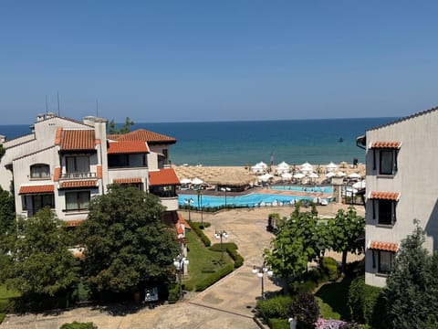 Property building, View (from property/room), Balcony/Terrace, Beach, Pool view, Sea view, Swimming pool
