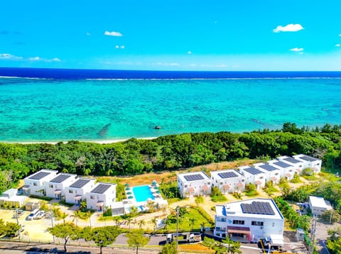 Property building, Day, Natural landscape, Bird's eye view, Beach, Beach, Pool view, Sea view, Swimming pool