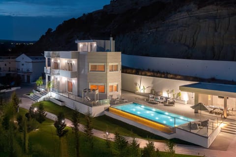 Property building, Night, Natural landscape, Mountain view, Pool view, Swimming pool, sunbed
