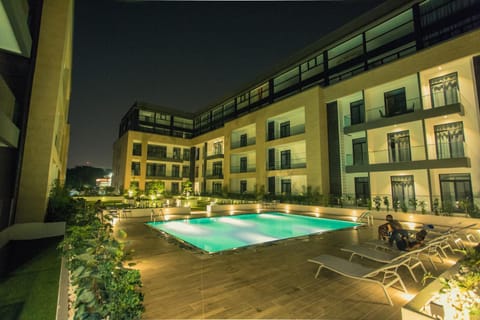 Property building, Night, Pool view, Swimming pool