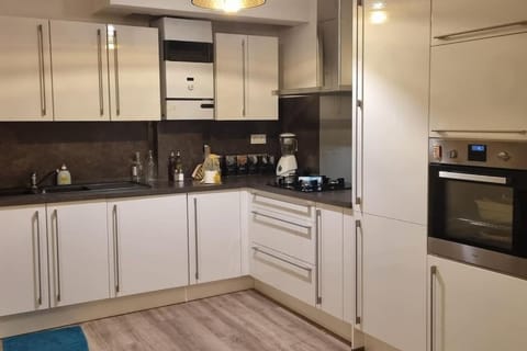 Kitchen or kitchenette, oven, stove, toaster