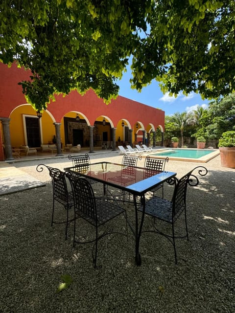 Property building, Patio, Garden, Dining area, Swimming pool