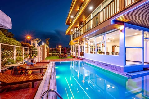 Patio, Night, Pool view, Swimming pool, Swimming pool, sunbed