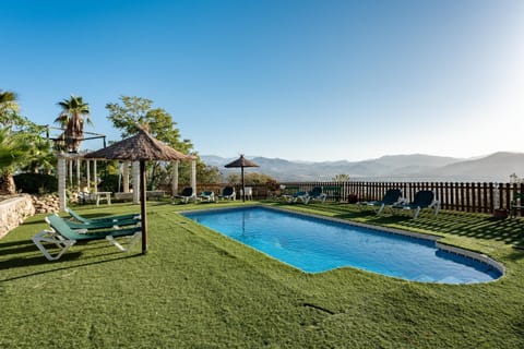 Property building, Living room, Swimming pool