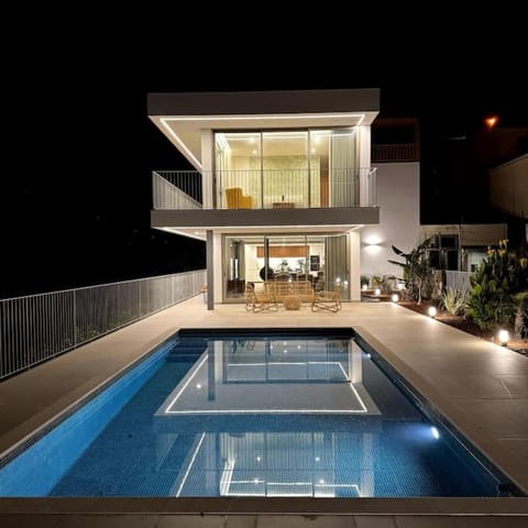 Property building, Night, Swimming pool