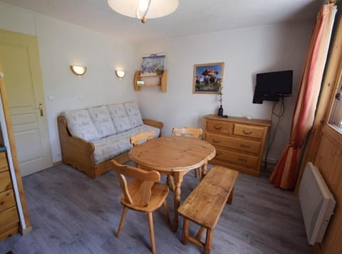 Bed, fireplace, kitchen