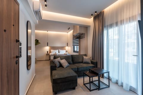 Bed, Living room, Seating area, wardrobe, air conditioner