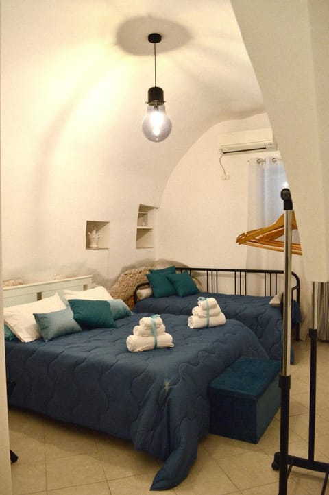 Bed, Bedroom, towels, air conditioner