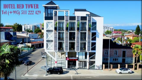 Property building, Day, Neighbourhood, Text overlay, City view, Street view, Location, Parking