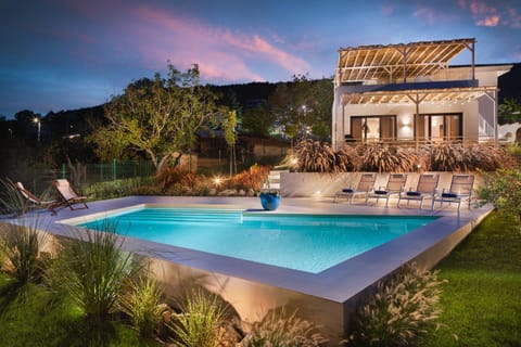 Property building, Patio, Night, Garden, Garden view, Pool view, Swimming pool
