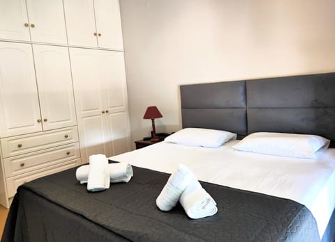 Bed, Photo of the whole room, Bedroom, towels, wardrobe