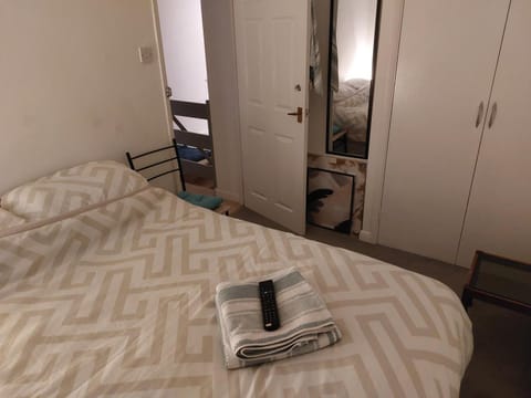 Bed, TV and multimedia, Bedroom, towels, wardrobe