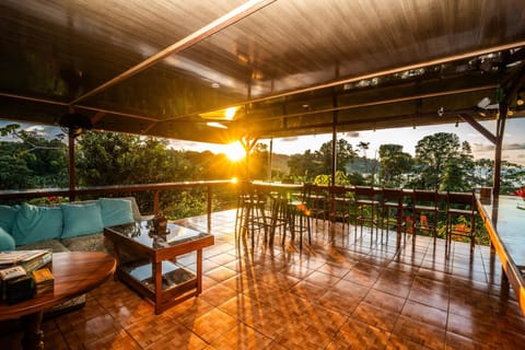 Balcony/Terrace, Living room, Seating area, Sunset