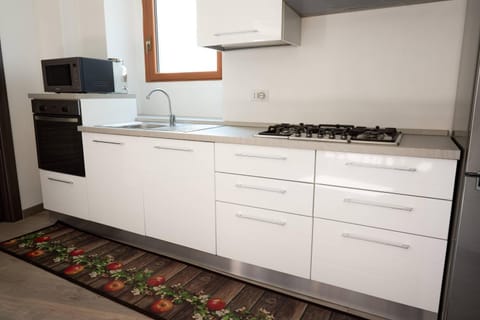 Kitchen or kitchenette, oven, stove