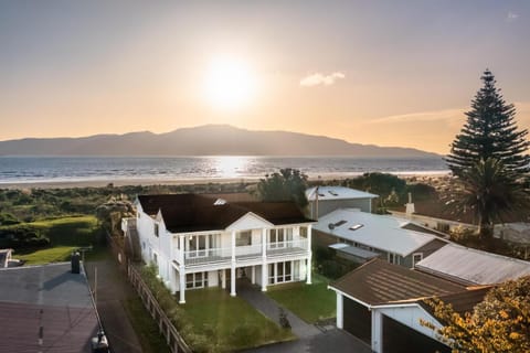 Property building, Nearby landmark, Beach, Beach, Sea view, Sunset