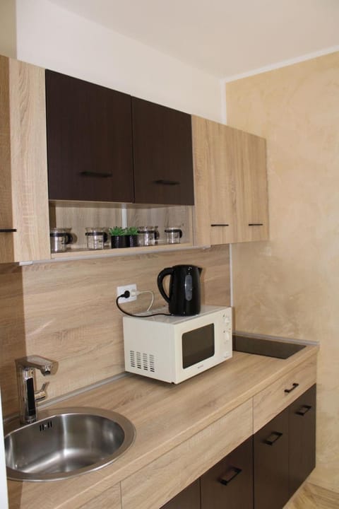 Kitchen or kitchenette, stove